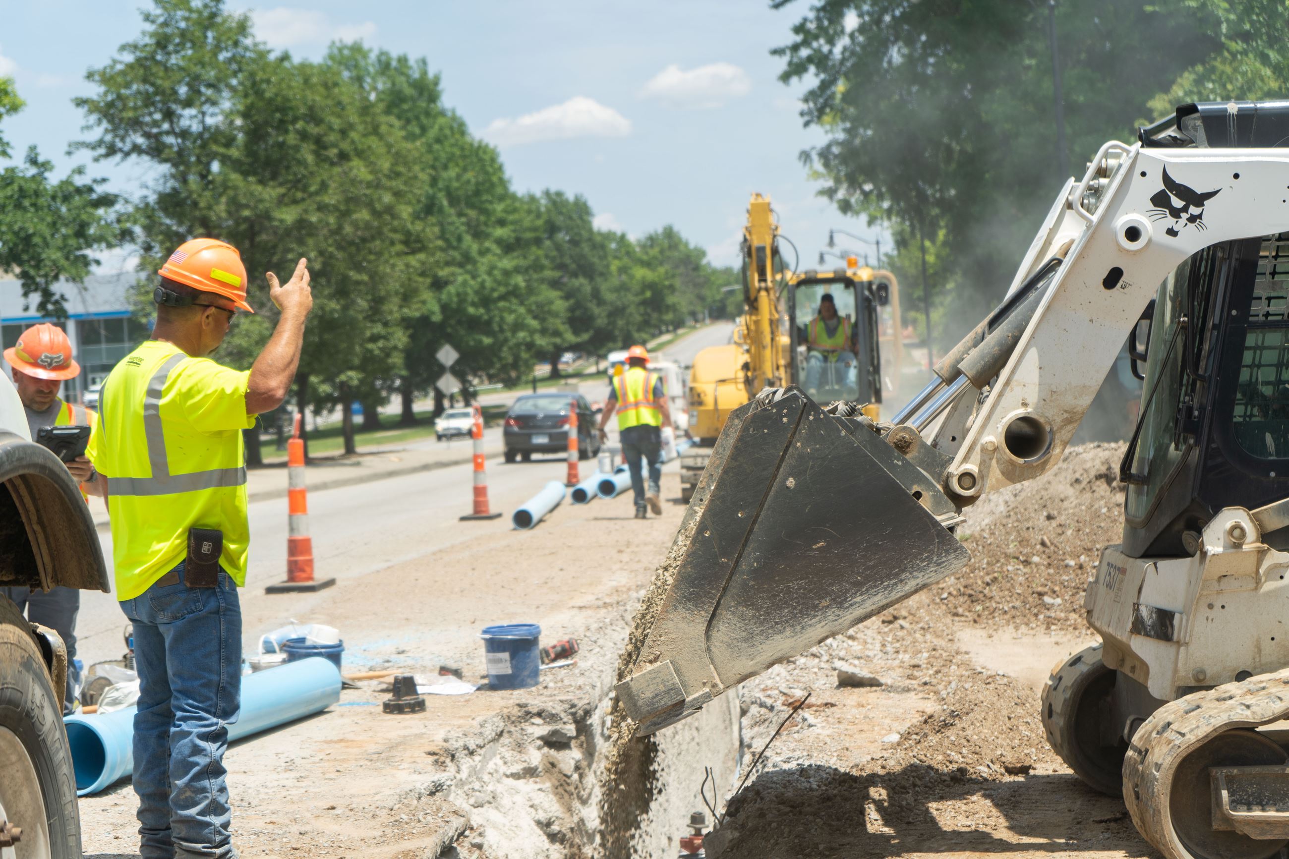 Construction workers installing a water main